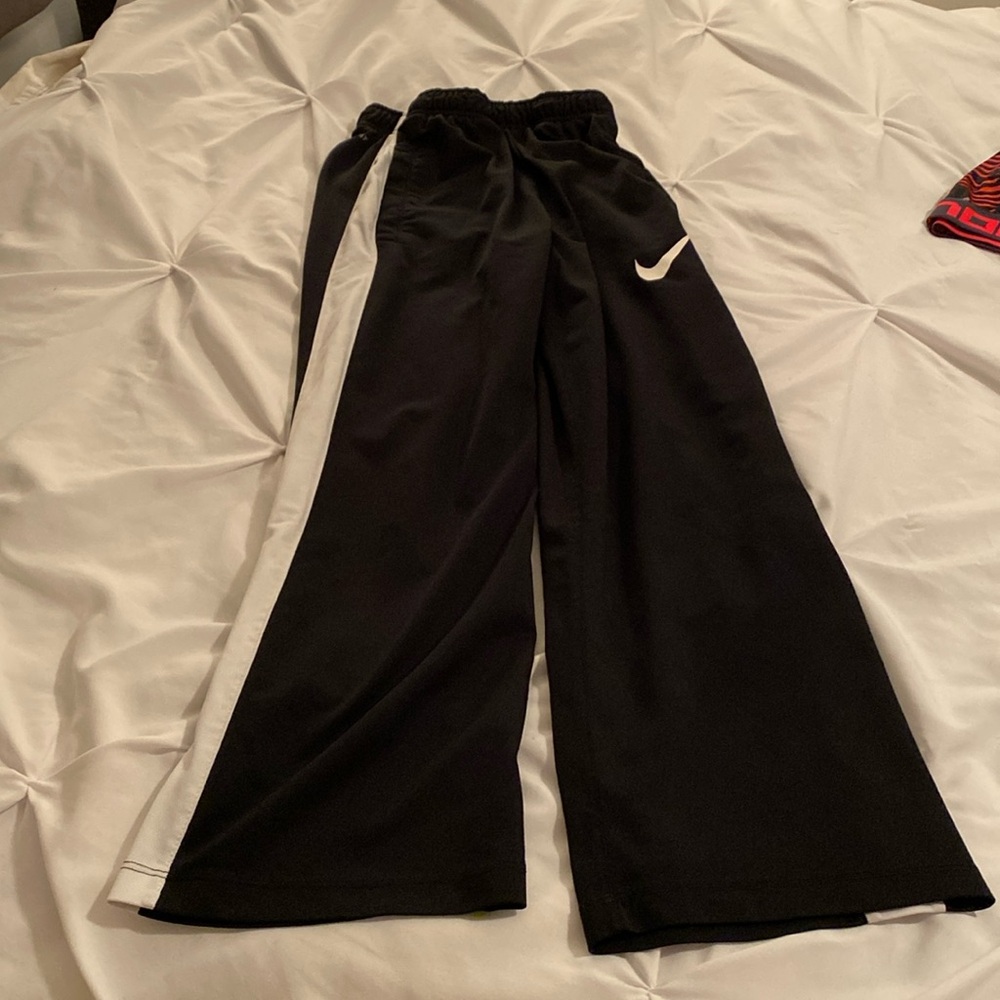 Nike boys size large track pants.